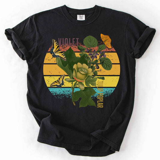 Black "Love local wildflowers, violet and tulip poplar" t-shirt on comfort colors tee. Featuring swallowtail and fritillary butterfly, tulip poplar and violet leaves and flower graphics. Gift for Ecology enthusiasts and wildlife gardeners.