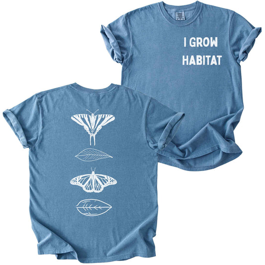 Blue jean "I Grow Habitat" t-shirt on Comfort Colors tee, featuring a small front chest text and a full back print of a Zebra Swallowtail and Monarch butterfly alternating with leaves in white line art. Butterfly gardener gift shirt for native plant and pollinator conservation fans.