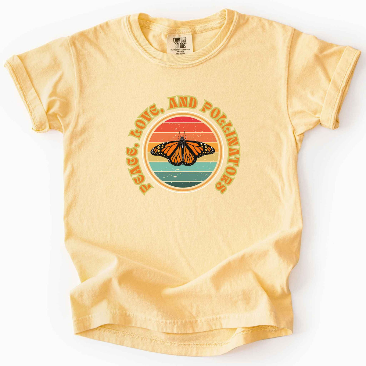 Butter "Peace, Love, and Pollinators" kids t-shirt on Comfort Colors tee, featuring a monarch butterfly against a retro rainbow sunset circle design. Butterfly gardener and native plant gift shirt for pollinator conservation fans.