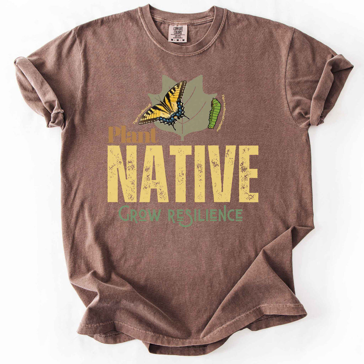 Espresso "Plant Native, Grow Resilience" t-shirt on Comfort Colors tee, featuring a Tiger Swallowtail butterfly and caterpillar on a leaf with bold distressed lettering. Gardener and native plant gift shirt for butterfly and pollinator conservation fans.