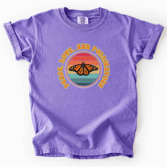 Violet "Peace, Love, and Pollinators" kids t-shirt on Comfort Colors tee, featuring a monarch butterfly against a retro rainbow sunset circle design. Butterfly gardener and native plant gift shirt for pollinator conservation fans.