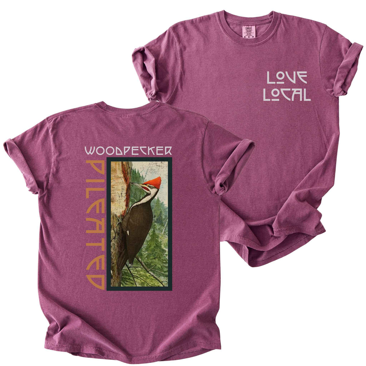 Berry "Pileated Woodpecker, Love Local" t-shirt on Comfort Colors tee, featuring a small front chest logo and a full vintage style back print of a woodpecker on a tree in a forest setting. Birdwatcher gift shirt for wildlife and nature enthusiasts.