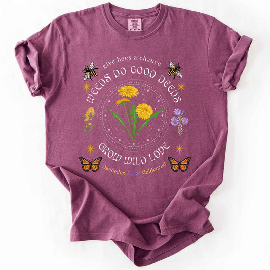 Berry "Weeds Do Good Deeds, Grow Wild Love" t-shirt on Comfort Colors tee, featuring dandelions, goldenrod, and aster wildflowers with bees and monarch butterflies in a celestial circle design. Gardener and pollinator lover gift shirt for wildflower and native plant enthusiasts.