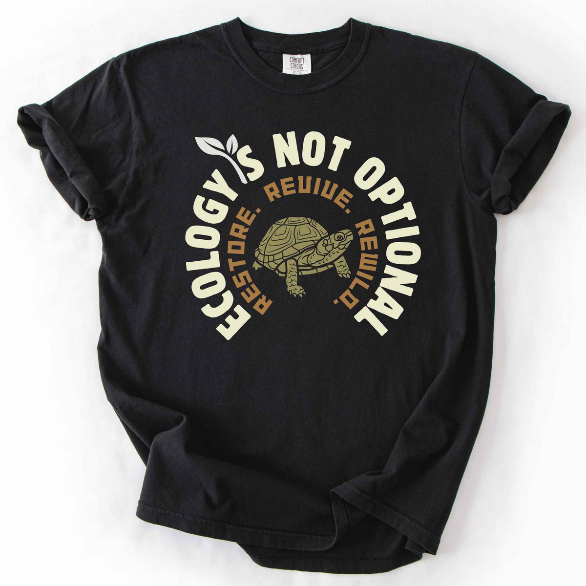 Black "Ecology Is Not Optional, Restore, Revive, Rewild" t-shirt on Comfort Colors tee, featuring a box turtle illustration within a circular design. Conservation and reptile lover gift shirt for ecologists and wildlife enthusiasts.