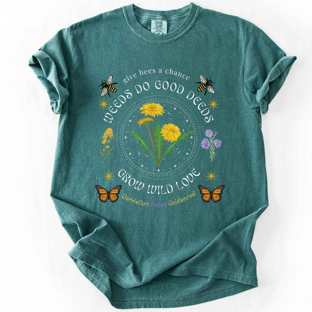 Blue Spruce "Weeds Do Good Deeds, Grow Wild Love" t-shirt on Comfort Colors tee, featuring dandelions, goldenrod, and aster wildflowers with bees and monarch butterflies in a celestial circle design. Gardener and pollinator lover gift shirt for wildflower and native plant enthusiasts.