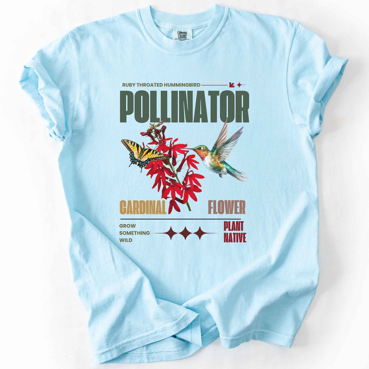 Chambray "Pollinator, Ruby Throated Hummingbird, Cardinal Flower" t-shirt on Comfort Colors tee, featuring a hummingbird and swallowtail butterfly on red cardinal flowers with retro poster style text. Gardener and native plant gift shirt for birdwatching and pollinator conservation fans.