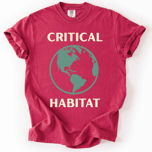 Chili "Critical Habitat" t-shirt on Comfort Colors tee, featuring a bold green globe graphic with cream lettering. Conservation and environmentalist gift shirt for earth science and wildlife protection advocates.