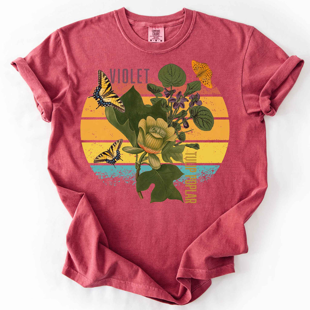 Crimson "Love local wildflowers, violet and tulip poplar" t-shirt on comfort colors tee. Featuring swallowtail and fritillary butterfly, tulip poplar and violet leaves and flower graphics. Gift for Ecology enthusiasts and wildlife gardeners. 