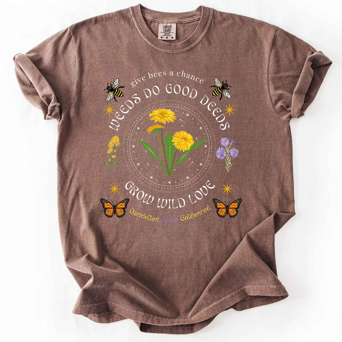 Espresso "Weeds Do Good Deeds, Grow Wild Love" t-shirt on Comfort Colors tee, featuring dandelions, goldenrod, and aster wildflowers with bees and monarch butterflies in a celestial circle design. Gardener and pollinator lover gift shirt for wildflower and native plant enthusiasts.