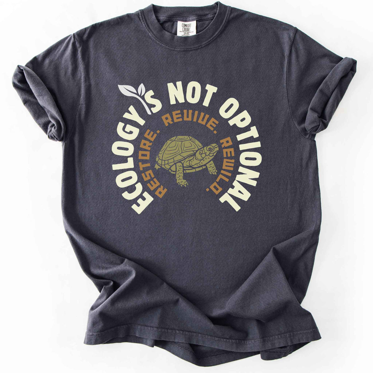Graphite "Ecology Is Not Optional, Restore, Revive, Rewild" t-shirt on Comfort Colors tee, featuring a box turtle illustration within a circular design. Conservation and reptile lover gift shirt for ecologists and wildlife enthusiasts.