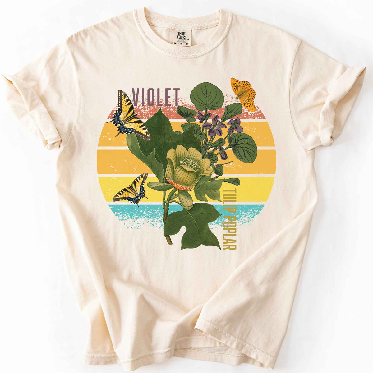 Ivory "Love local wildflowers, violet and tulip poplar" t-shirt on comfort colors tee. Featuring swallowtail and fritillary butterfly, tulip poplar and violet leaves and flower graphics. Gift for Ecology enthusiasts and wildlife gardeners. 