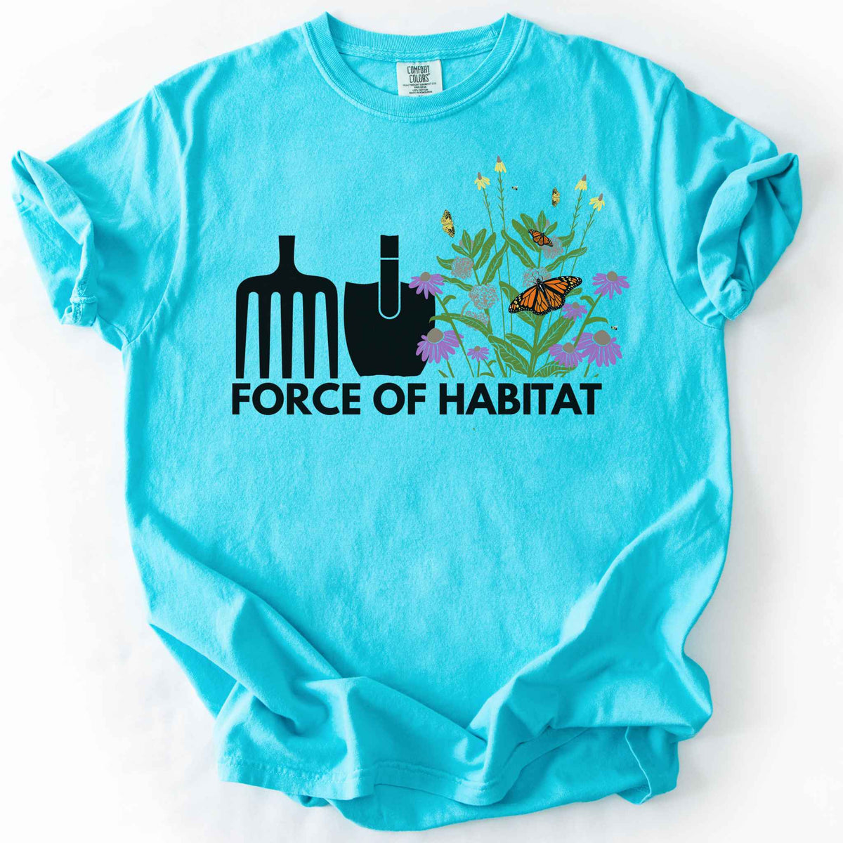 Lagoon Blue Force of Habitat" t-shirt on Comfort Colors tee, featuring simple garden tool graphics beside a coneflower and milkweed patch with monarch and fritillary butterflies. Gardener and native plant gift shirt for pollinator conservation fans.