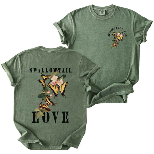 Moss "Respect the Locals, Swallowtail Love" t-shirt on Comfort Colors tee, featuring a small front chest logo and a full illustrated back print of Tiger Swallowtail butterflies on apple blossoms with bold black lettering. Butterfly lover gift shirt for native pollinator and garden enthusiasts.