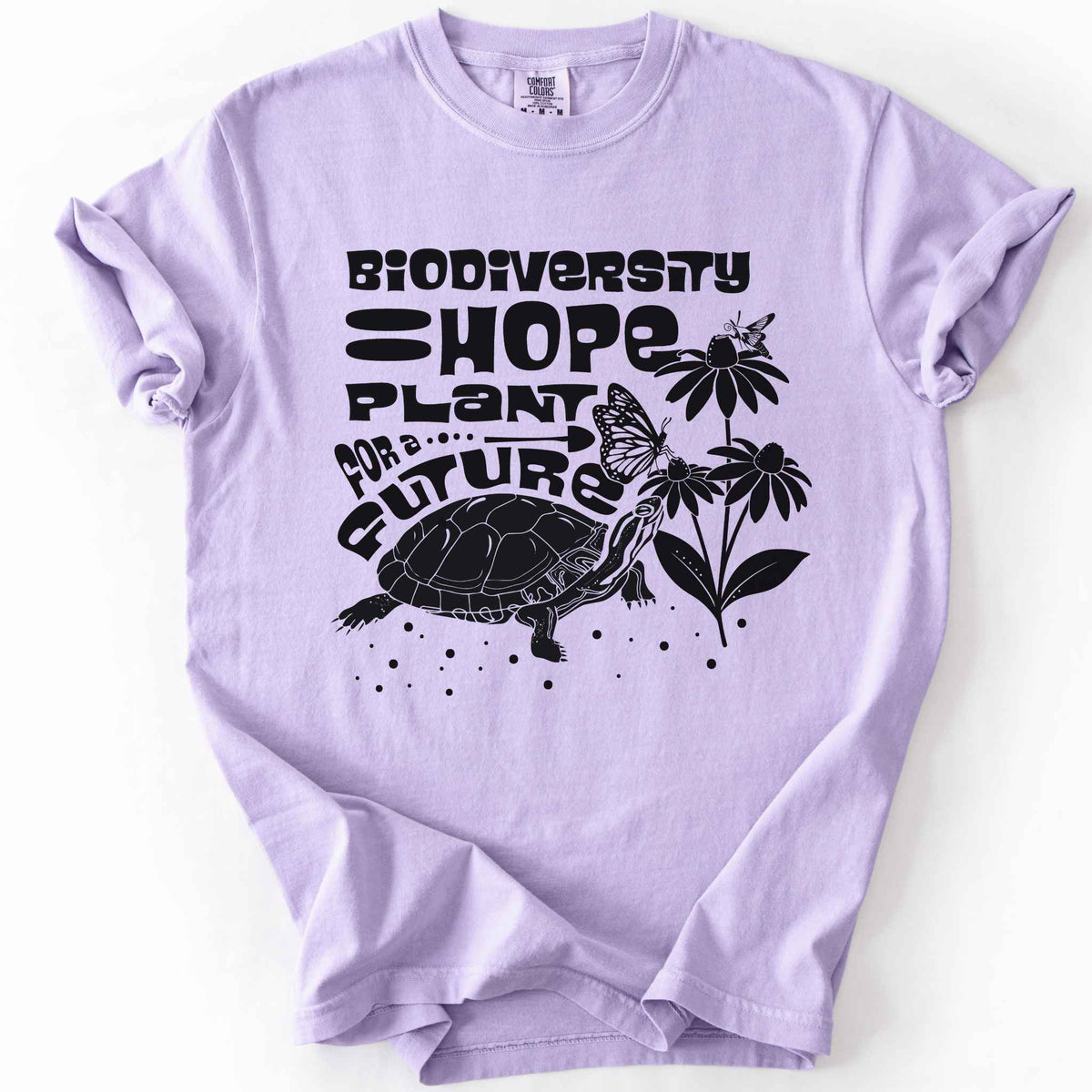 Orchid "Biodiversity Hope, Plant for a Future" t-shirt on Comfort Colors tee, featuring a black graphic of a turtle with monarch butterflies on coneflowers in bold groovy lettering. Conservation and native plant gift shirt for wildlife and biodiversity.