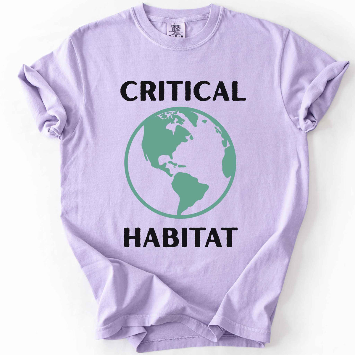 Orchid "Critical Habitat" t-shirt on Comfort Colors tee, featuring a bold green globe graphic with black lettering. Conservation and environmentalist gift shirt for earth science and wildlife protection advocates.