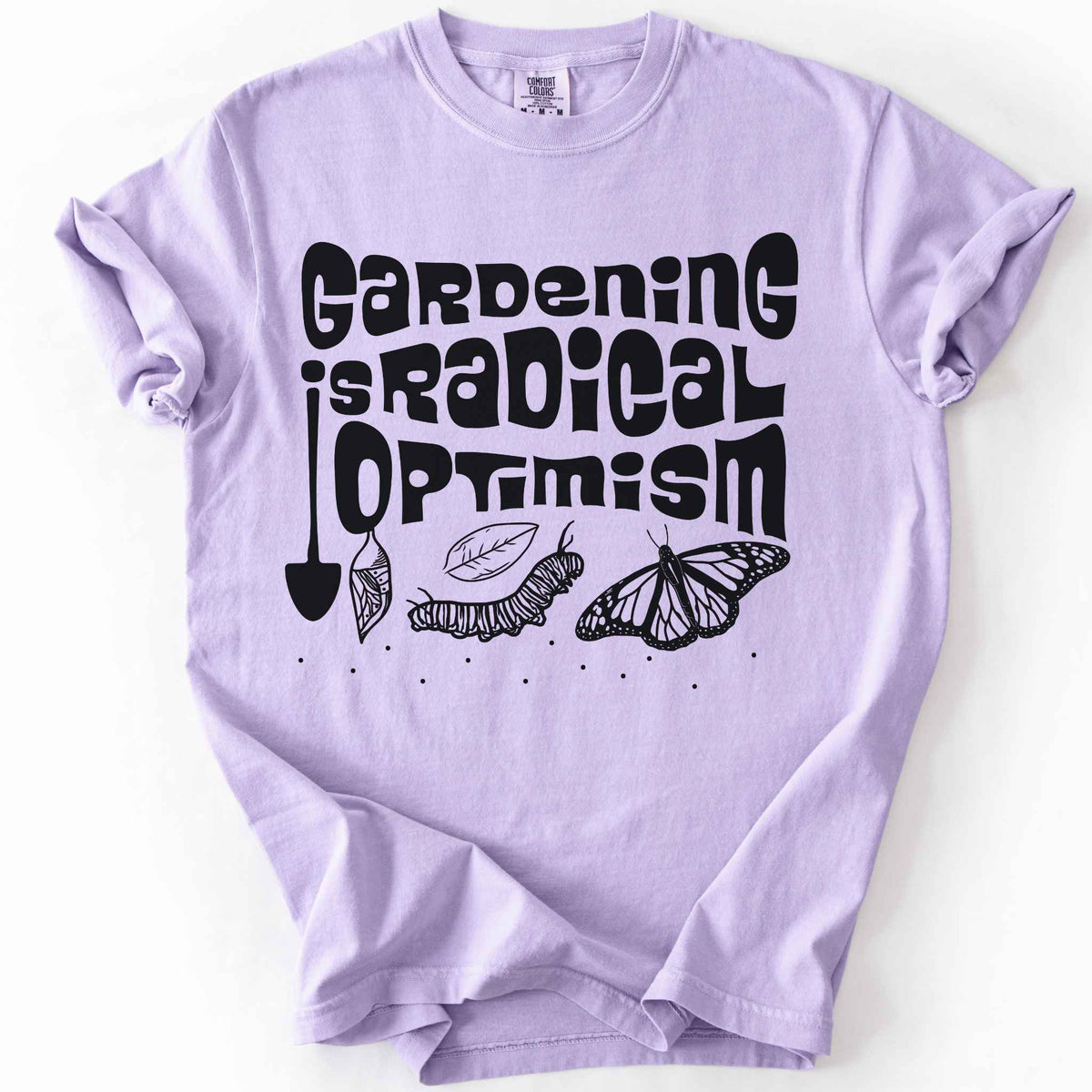 Orchid "Gardening Is Radical Optimism" t-shirt on Comfort Colors tee, featuring a butterfly life cycle illustration with a garden shovel and retro lettering. Gardener and native plant gift shirt for pollinator and butterfly conservation fans.