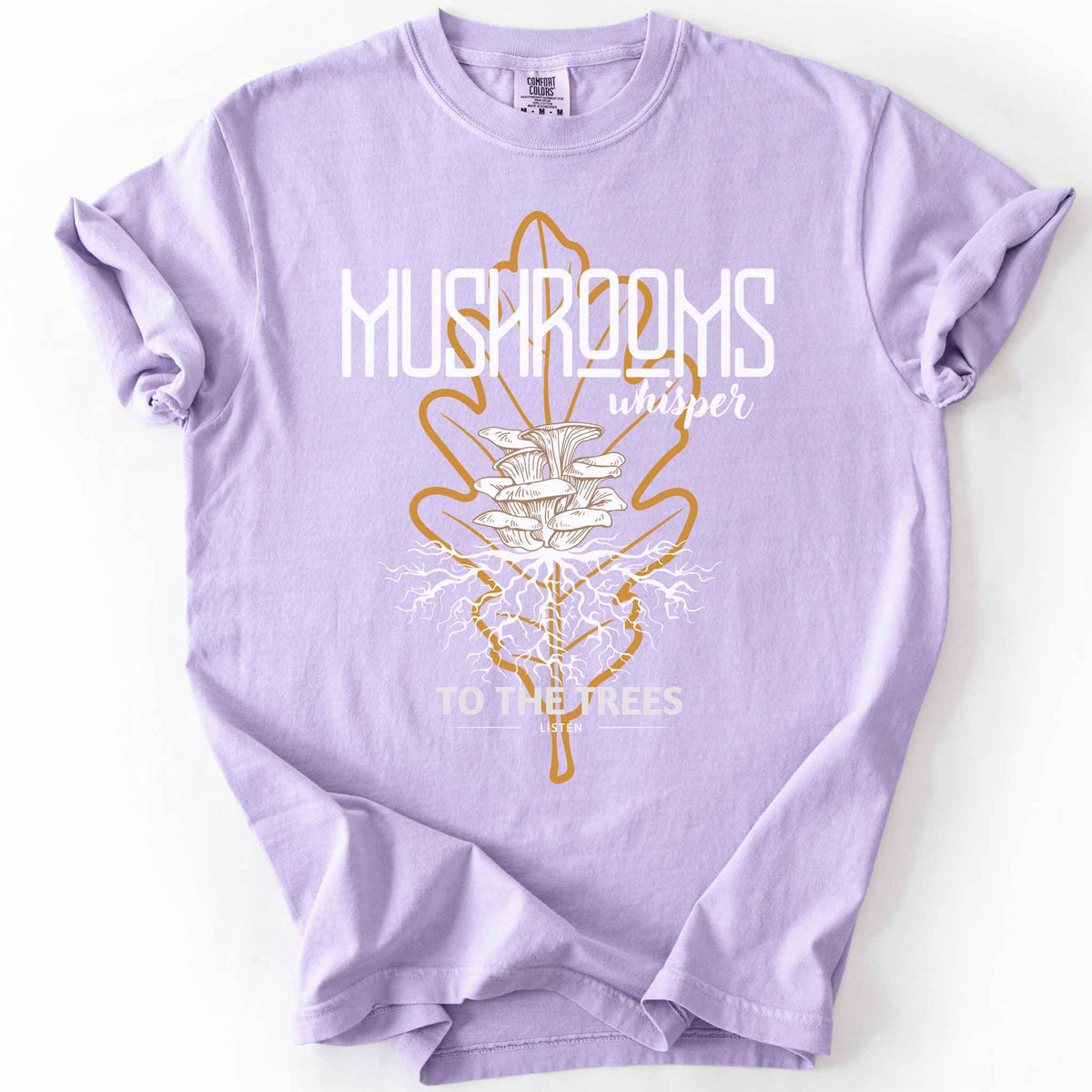 Orchid "Mushrooms Whisper to the Trees, Listen" t-shirt on Comfort Colors tee, featuring mushrooms growing from a mycelium root system inside a golden leaf outline. Mycology and forest lover gift shirt for foragers and mushroom enthusiasts.