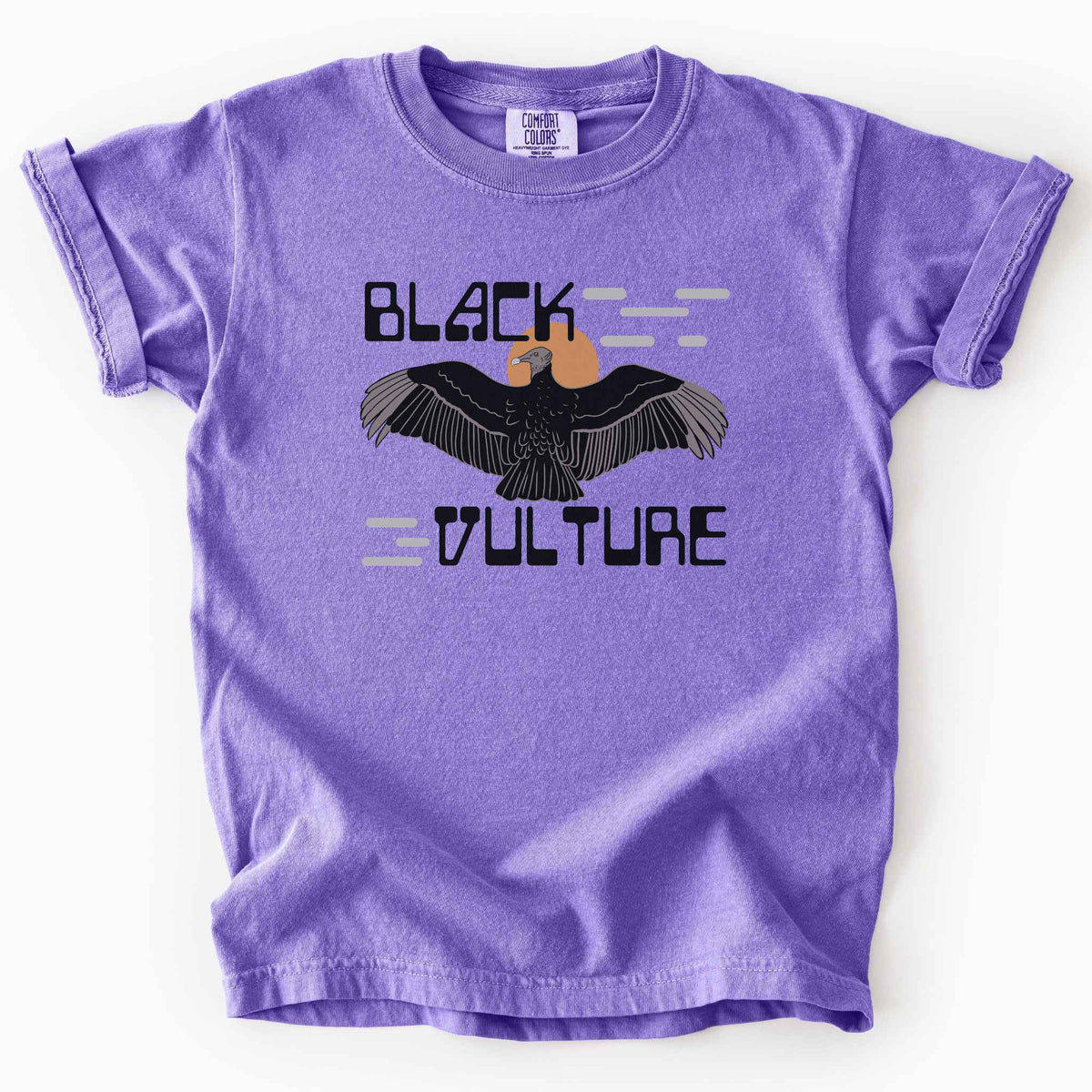 Violet "Black Vulture" kids t-shirt on Comfort Colors tee, featuring a vulture with spread wings against an orange sun with bold geometric lettering. Birdwatcher and scavenger lover gift shirt for wildlife and nature enthusiasts.