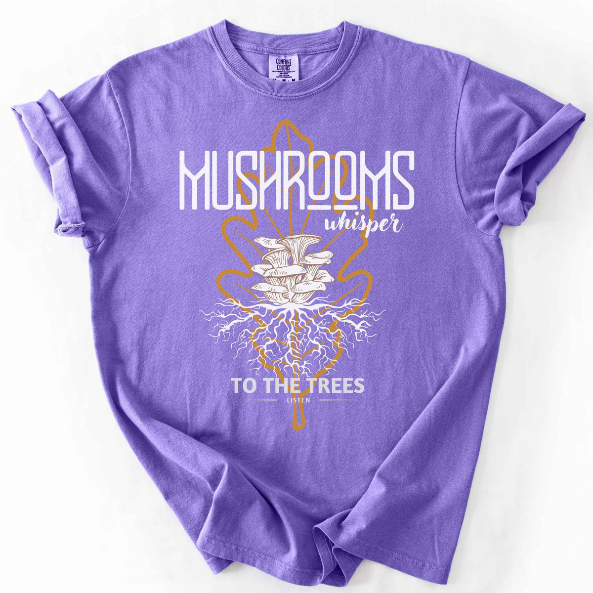 Violet "Mushrooms Whisper to the Trees, Listen" t-shirt on Comfort Colors tee, featuring mushrooms growing from a mycelium root system inside a golden leaf outline. Mycology and forest lover gift shirt for foragers and mushroom enthusiasts.
