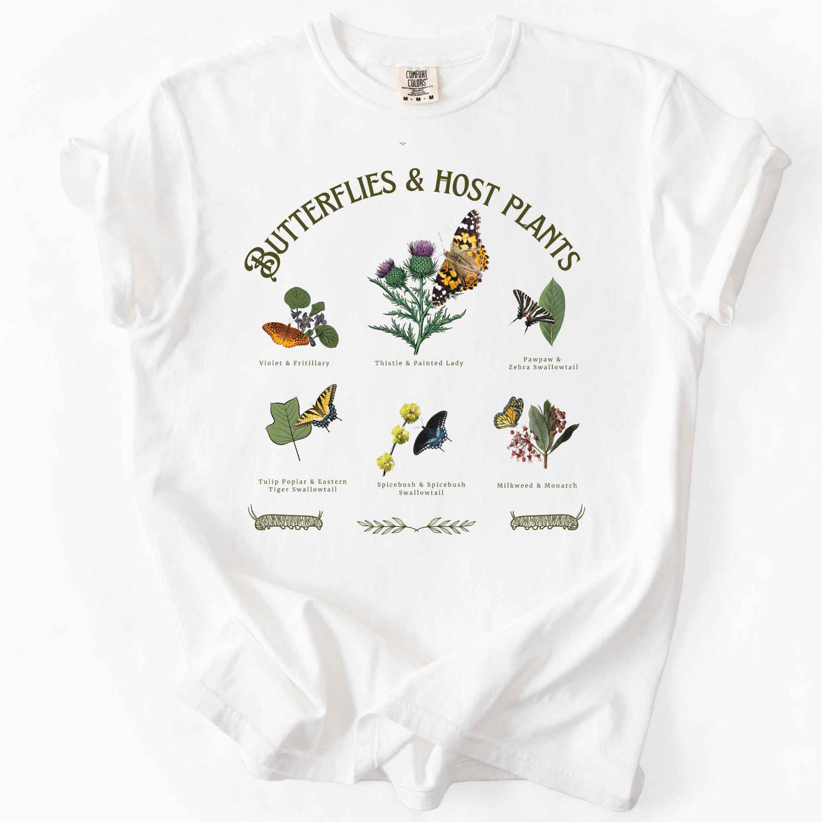 White "Butterflies & Host Plants" t-shirt on Comfort Colors tee, featuring six graphic designed butterfly and plant pairings including Monarch on Milkweed, Painted Lady on Thistle, and Eastern Tiger Swallowtail on Tulip Poplar. Botanical gift shirt for butterfly gardeners and nature lovers.