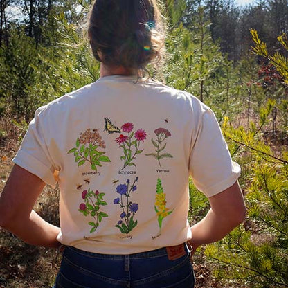 Woman in Wildflower Tshirt in Field.
